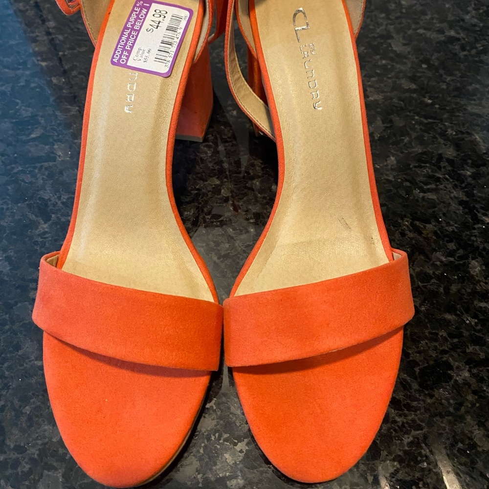 NEW. Flaming orange. Never worn. Suede-like material. 3” heels. Cute for summer!